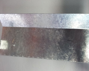 Partition for automatic discharger w/ 2 outlets